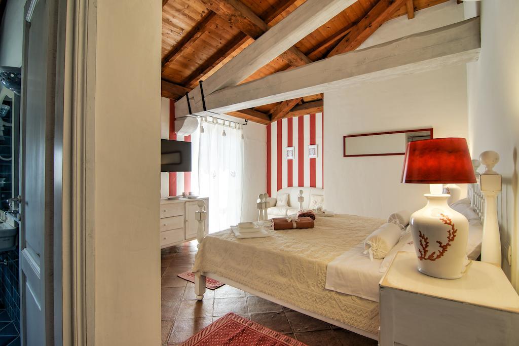 Domus Corallia-Luxury Rooms Порто Ротондо Стая снимка